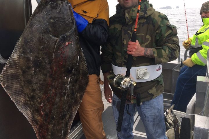 a person holding a fish