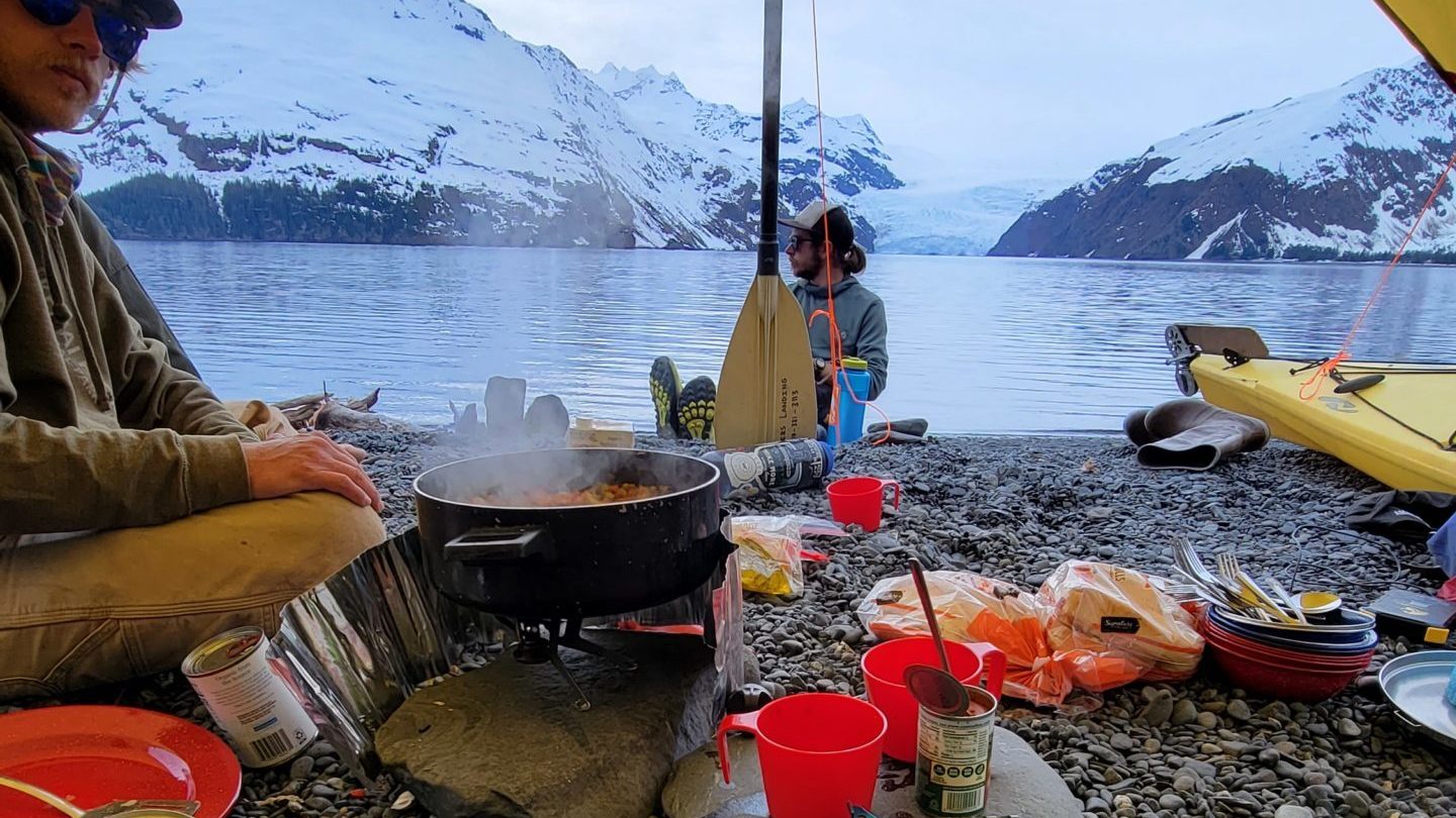 a close up of an umbrella on a boat in the water