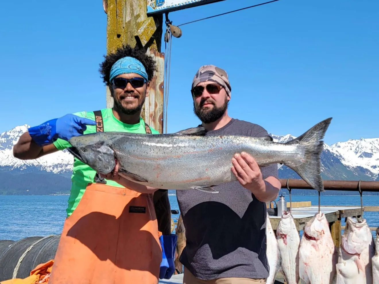 a person holding a fish