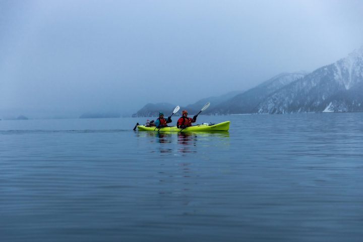 a small boat in a body of water