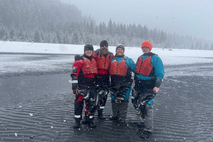 a group of people that are standing in the snow