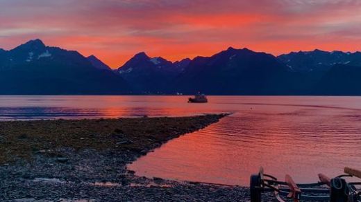 a sunset over a body of water