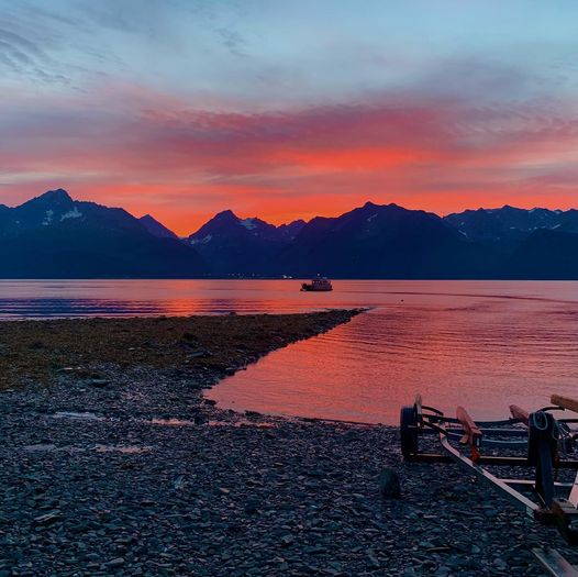 a sunset over a body of water