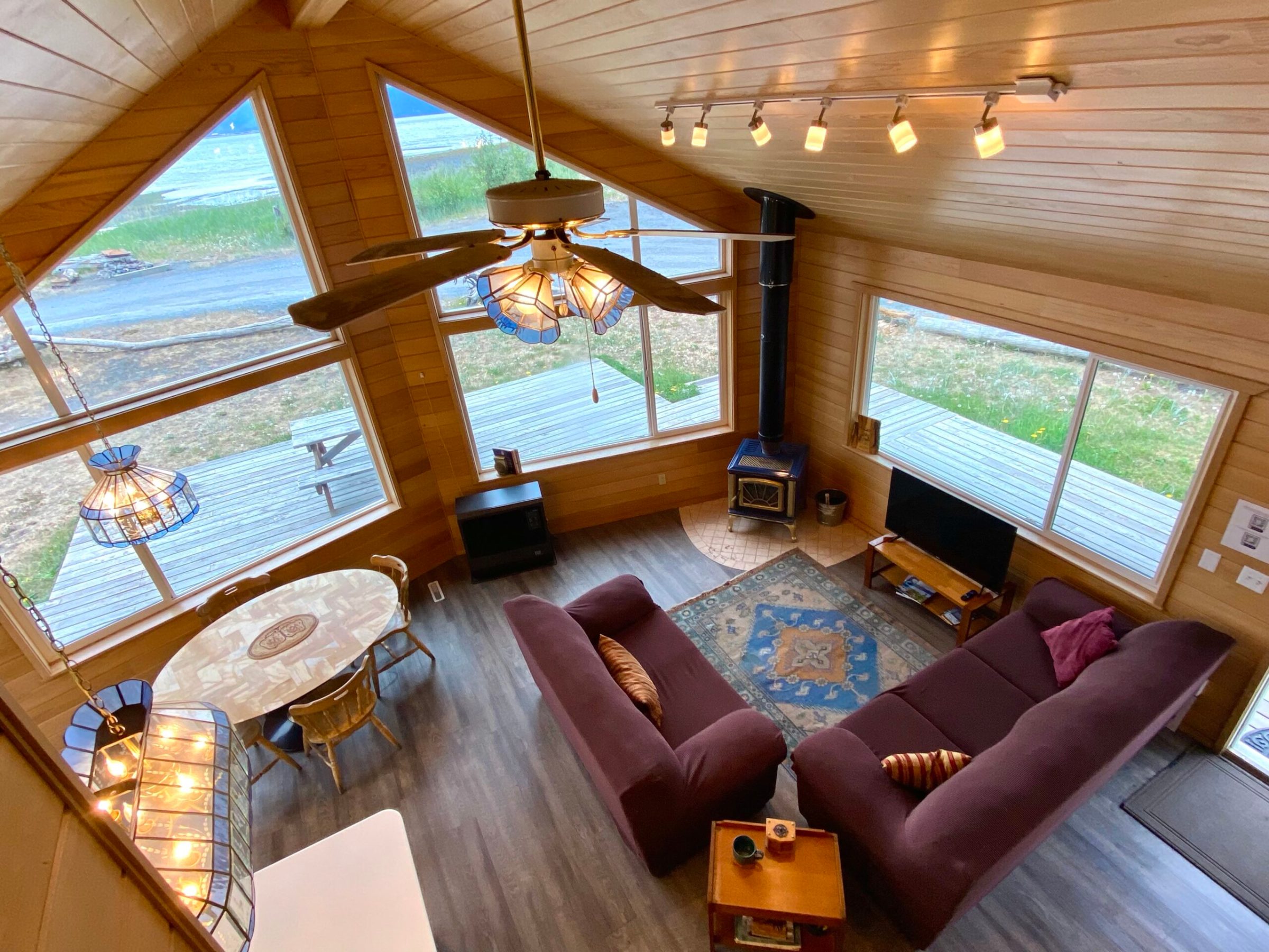 a living room filled with furniture and a fire place