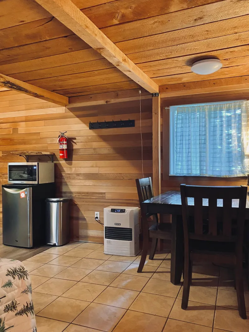 a kitchen with a table in a room