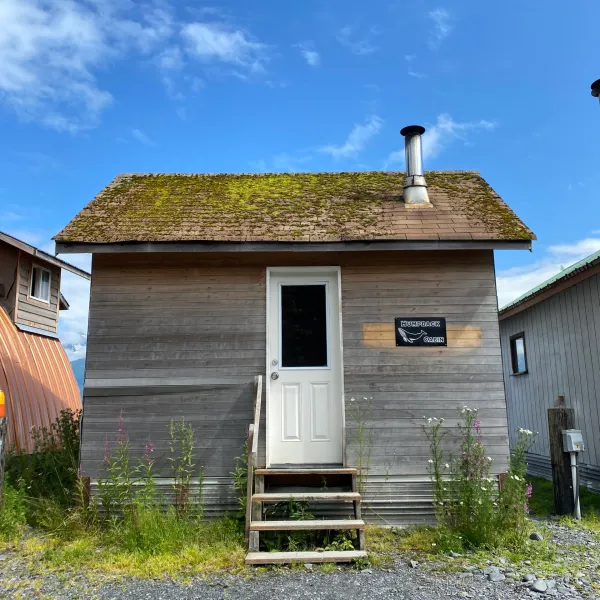 a bench in front of a house