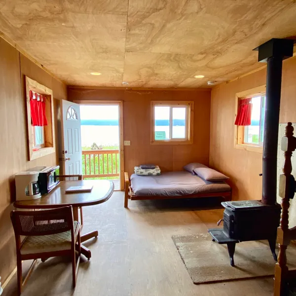 a living room filled with furniture and a fireplace