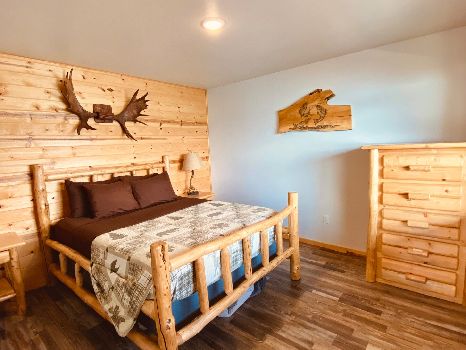 a bedroom with a wooden floor