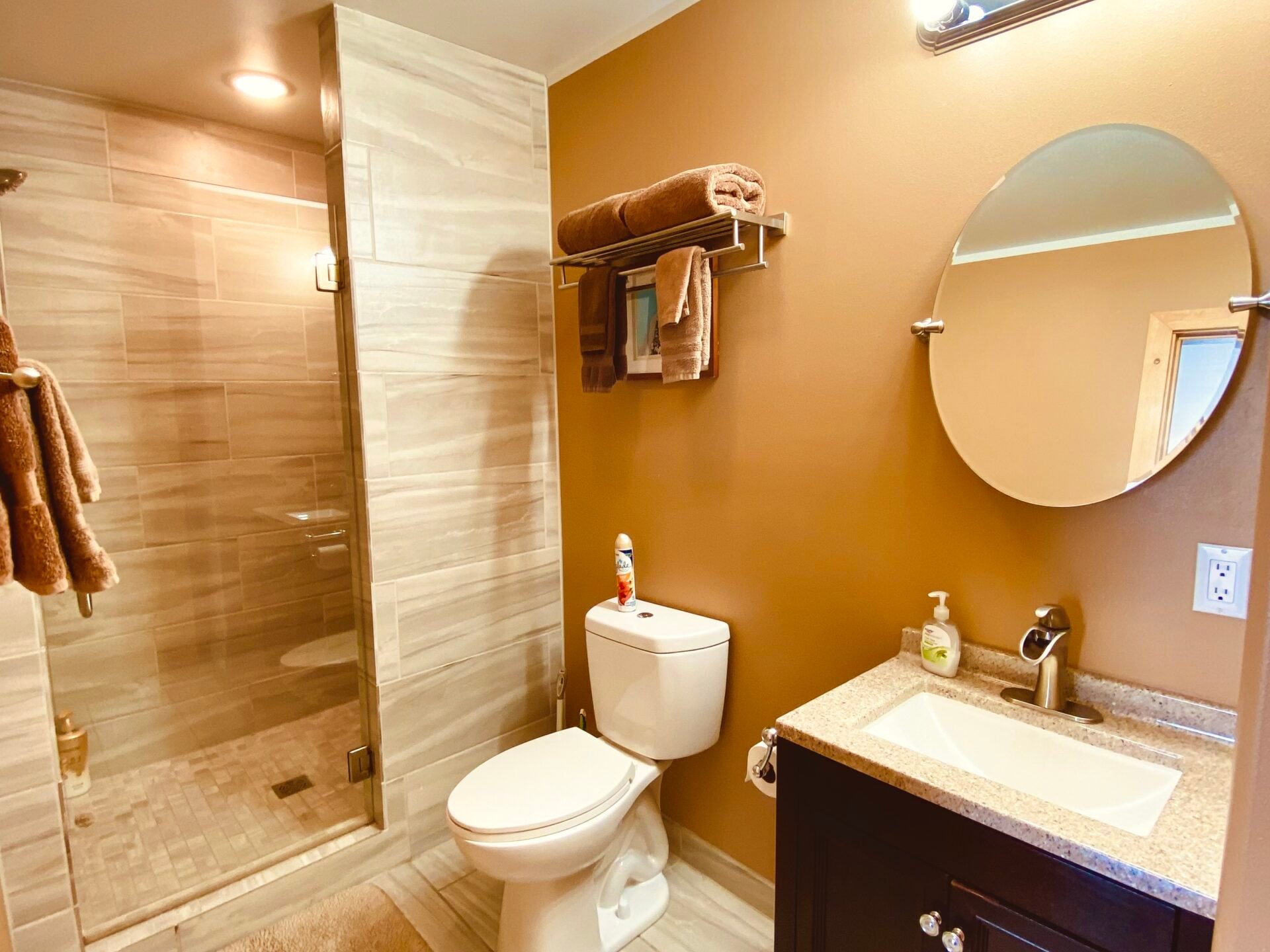 a room with a sink and a mirror