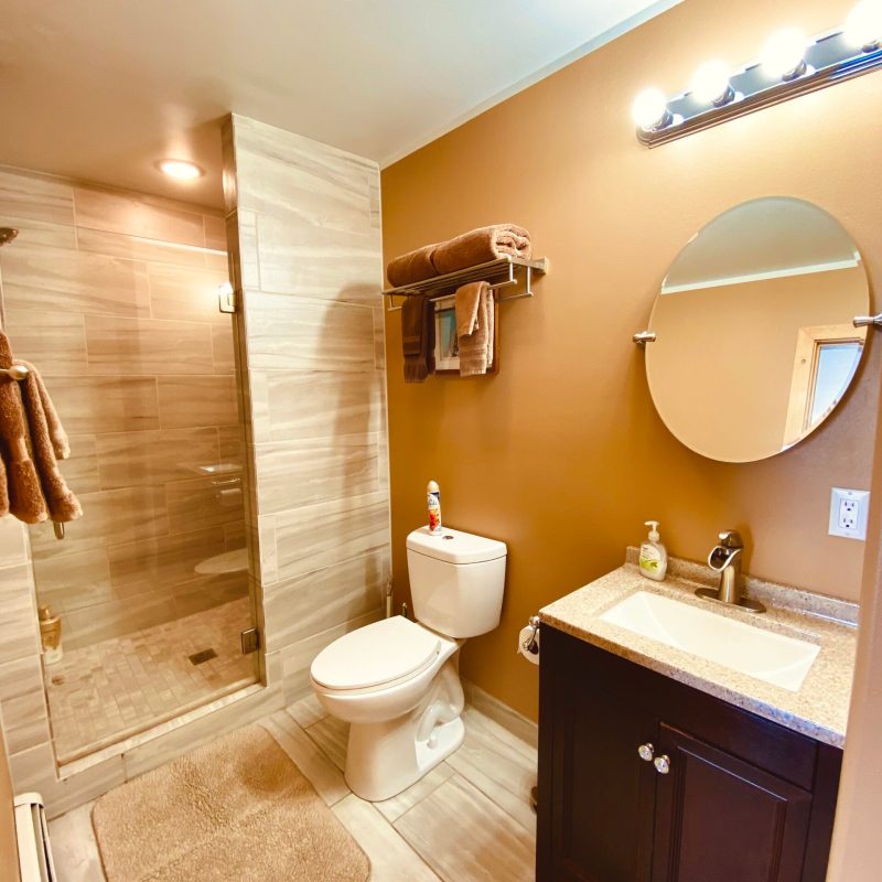 a room with a sink and a mirror