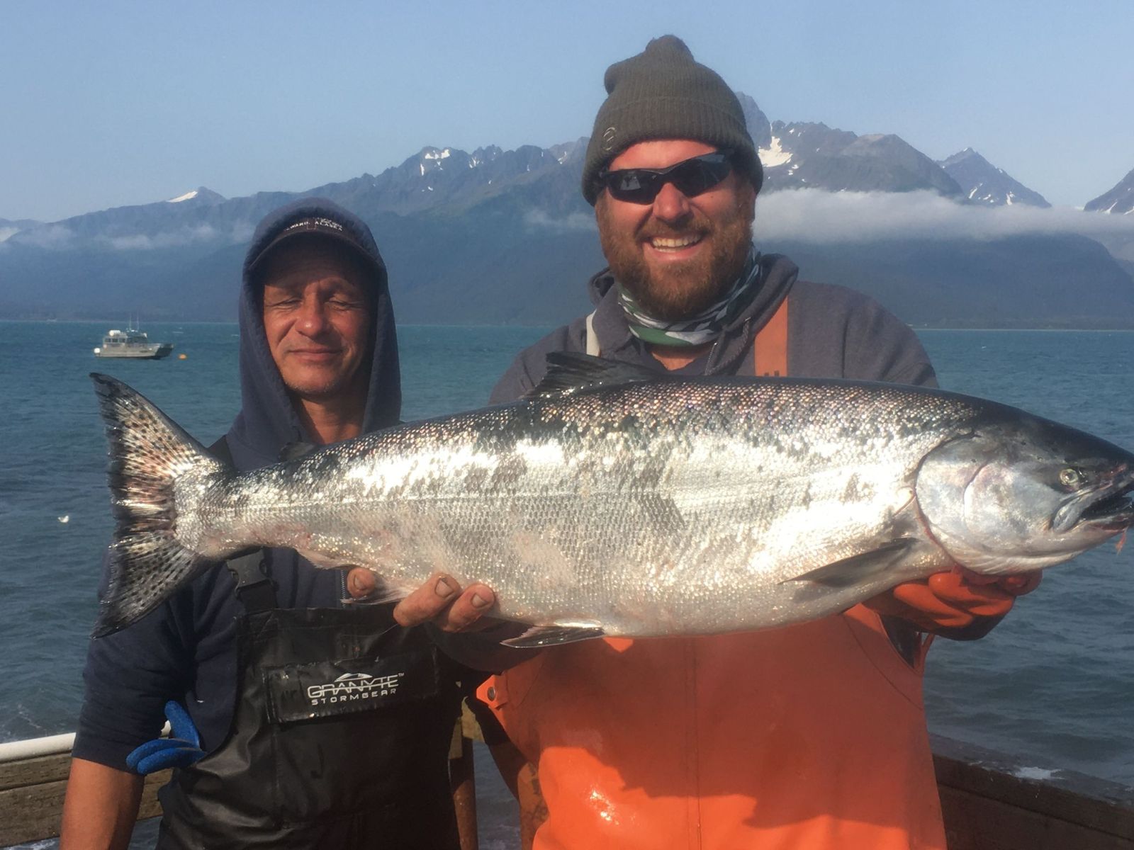 King salmon being held by captain paul Millers Landing Seward Alaska Beach Seaside