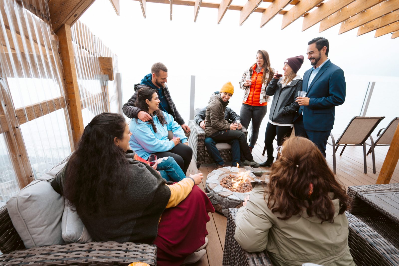 a group of people sitting in front of a building