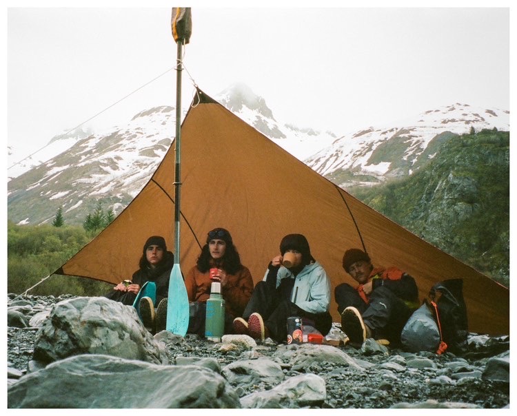 a group of people in a tent