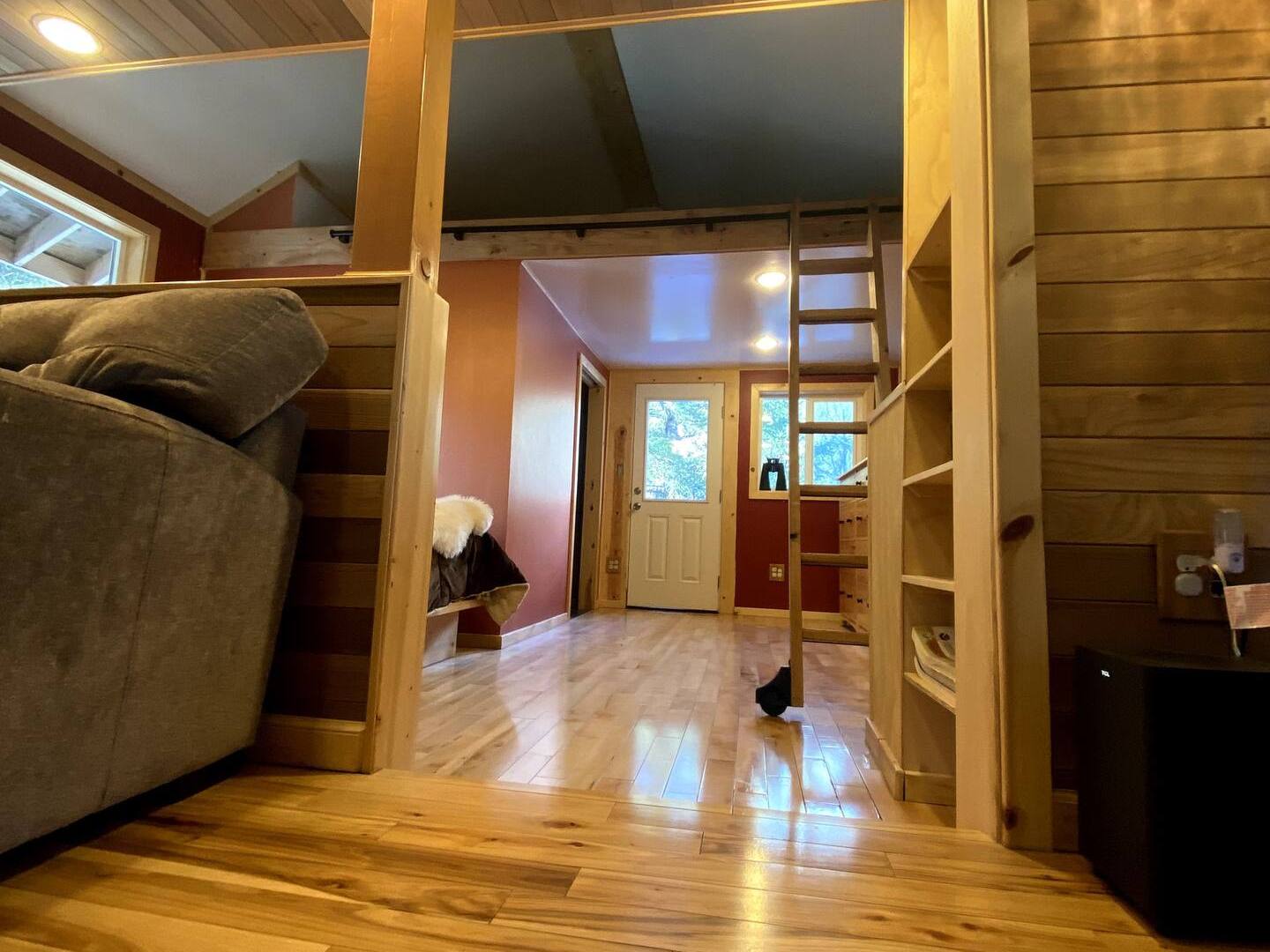 a view of a living room with a wood floor