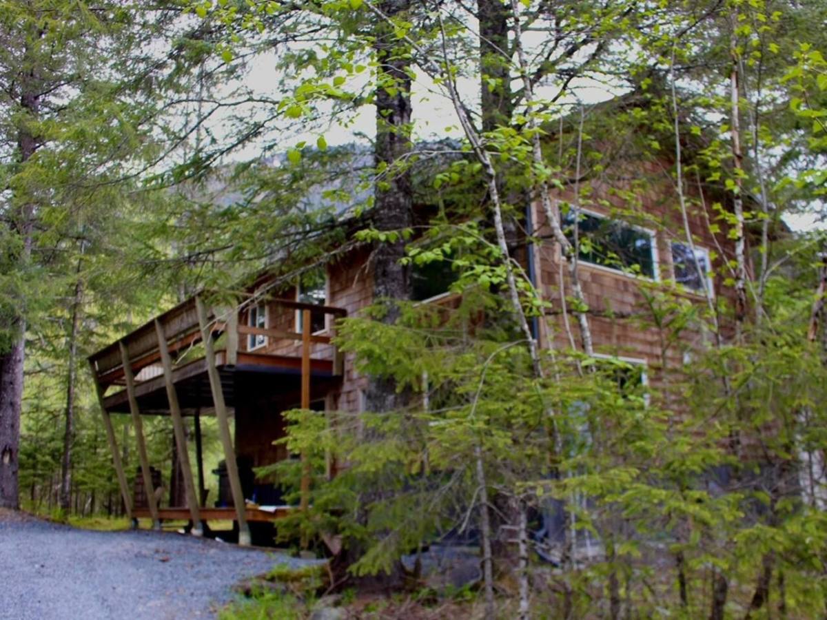 a house with trees in the background