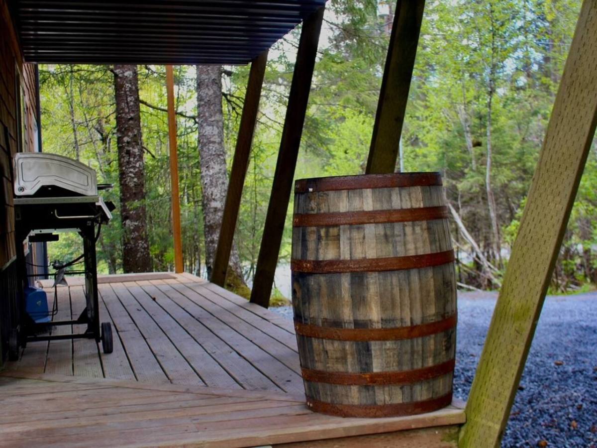 a barrel next to the grill area