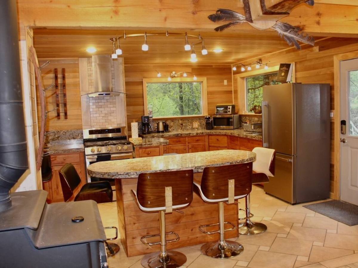 a room filled with furniture and a stove