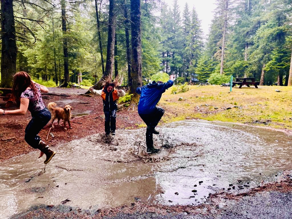 a group of people in a forest