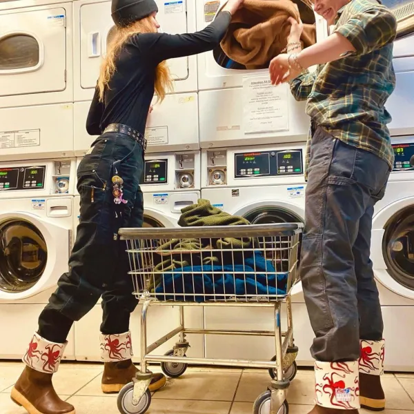 a group of people standing in a room