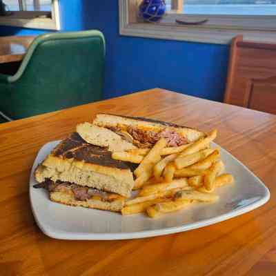 a tray of food on a wooden table
