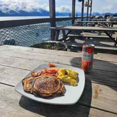 a plate of food on a picnic table