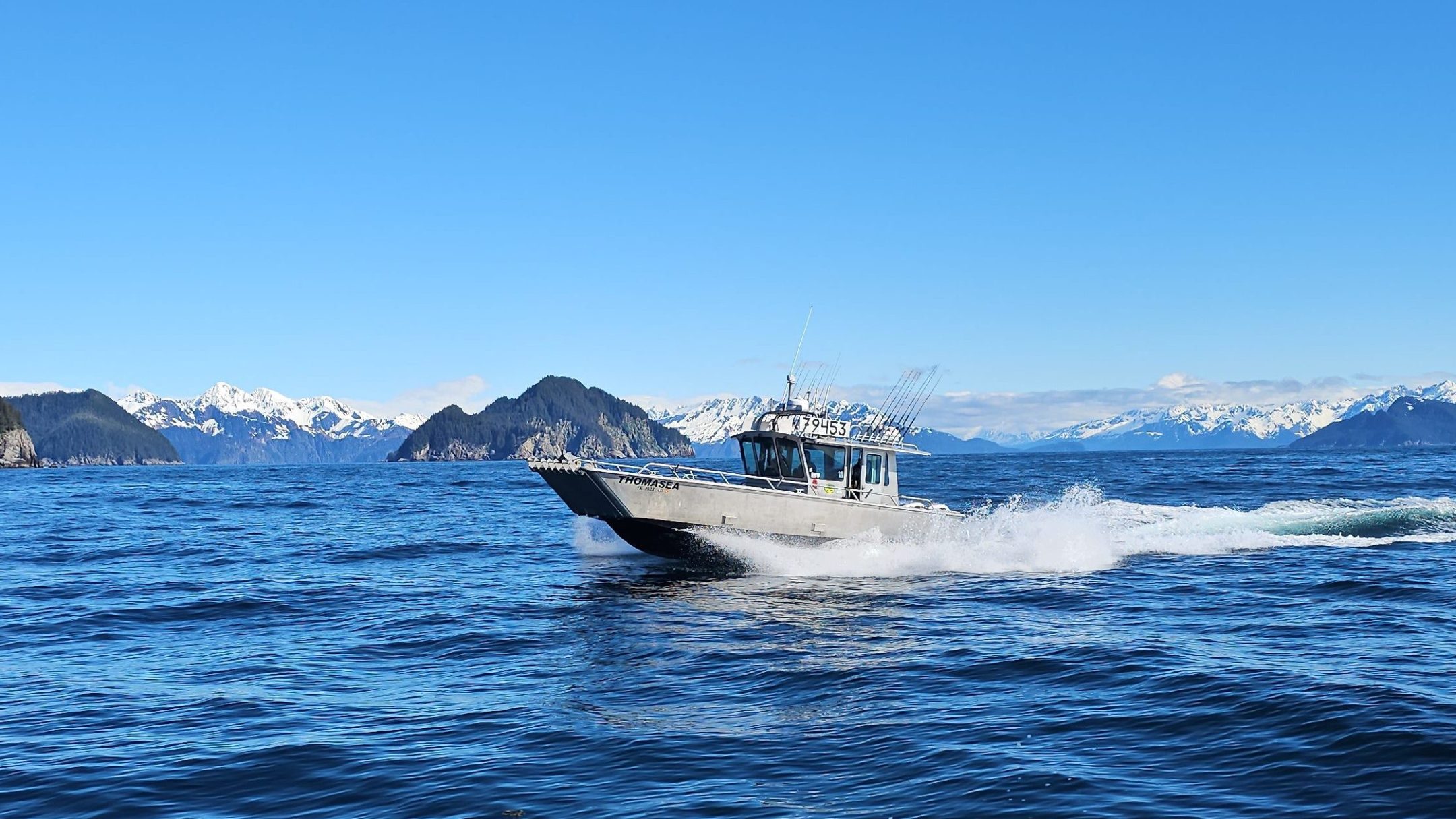 a man riding a wave on top of a body of water