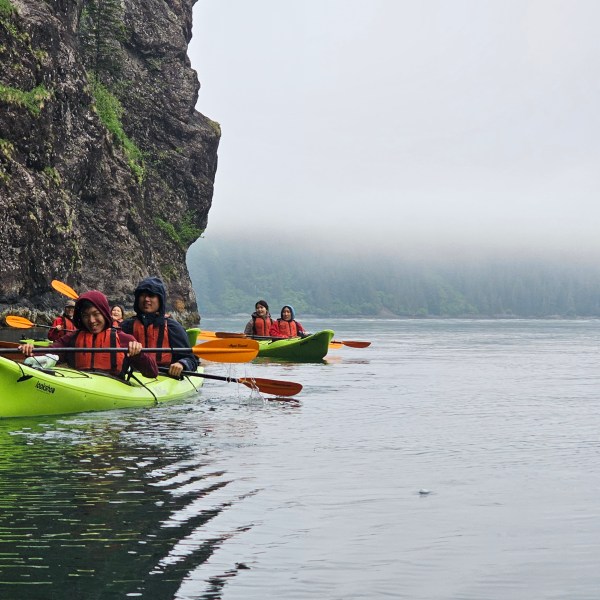 a small boat in a body of water