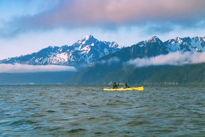 a boat on a body of water with a mountain in the background