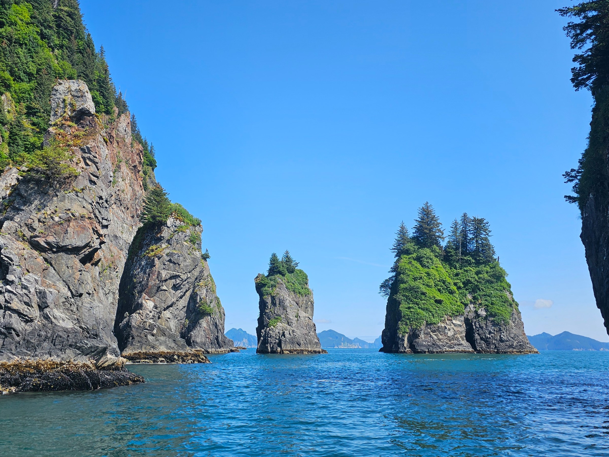 a photo of the Spire Cove with the Resurrection bay in the background