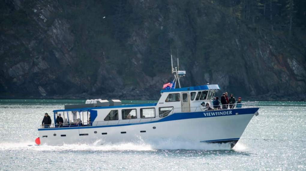 a small boat in a large body of water