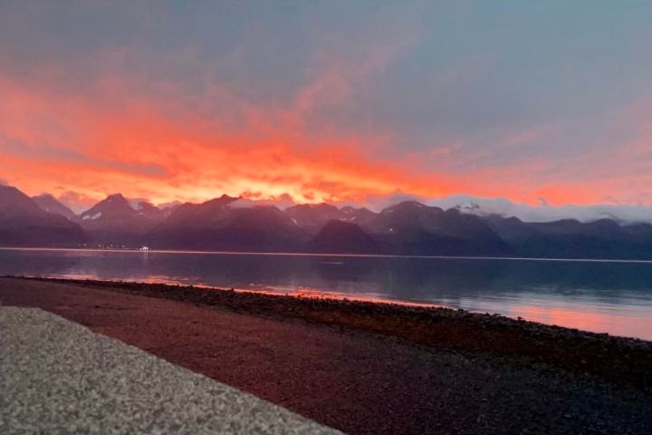 Seaside sunset at Oceanfront Inn Millers Landing Seward Alaska
