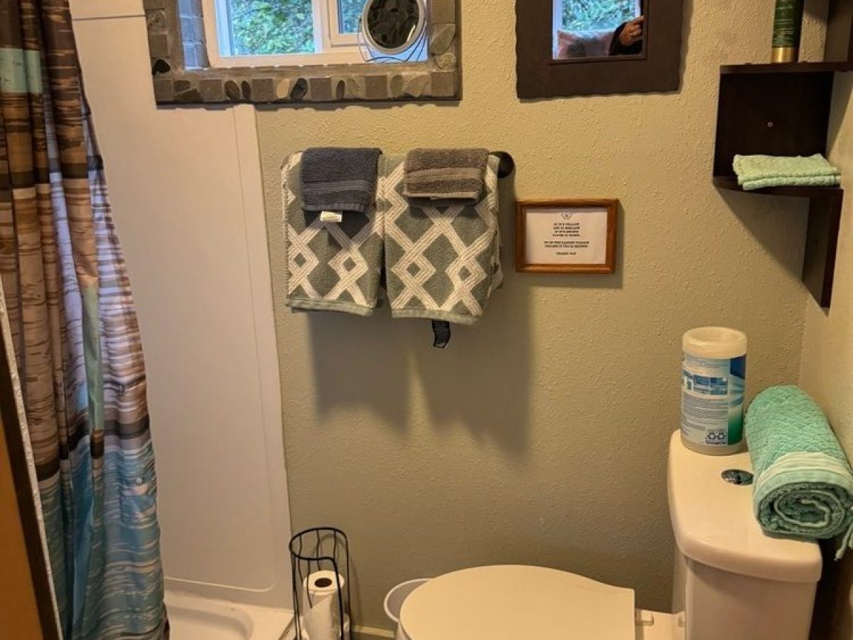 a room with a sink and a mirror