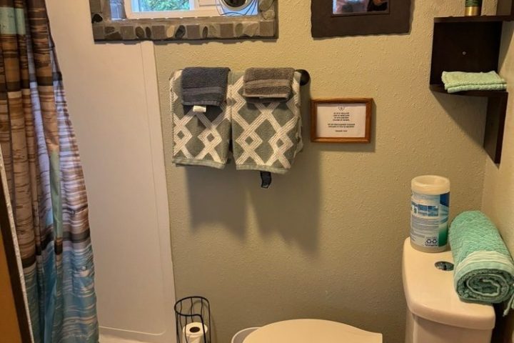 a room with a sink and a mirror