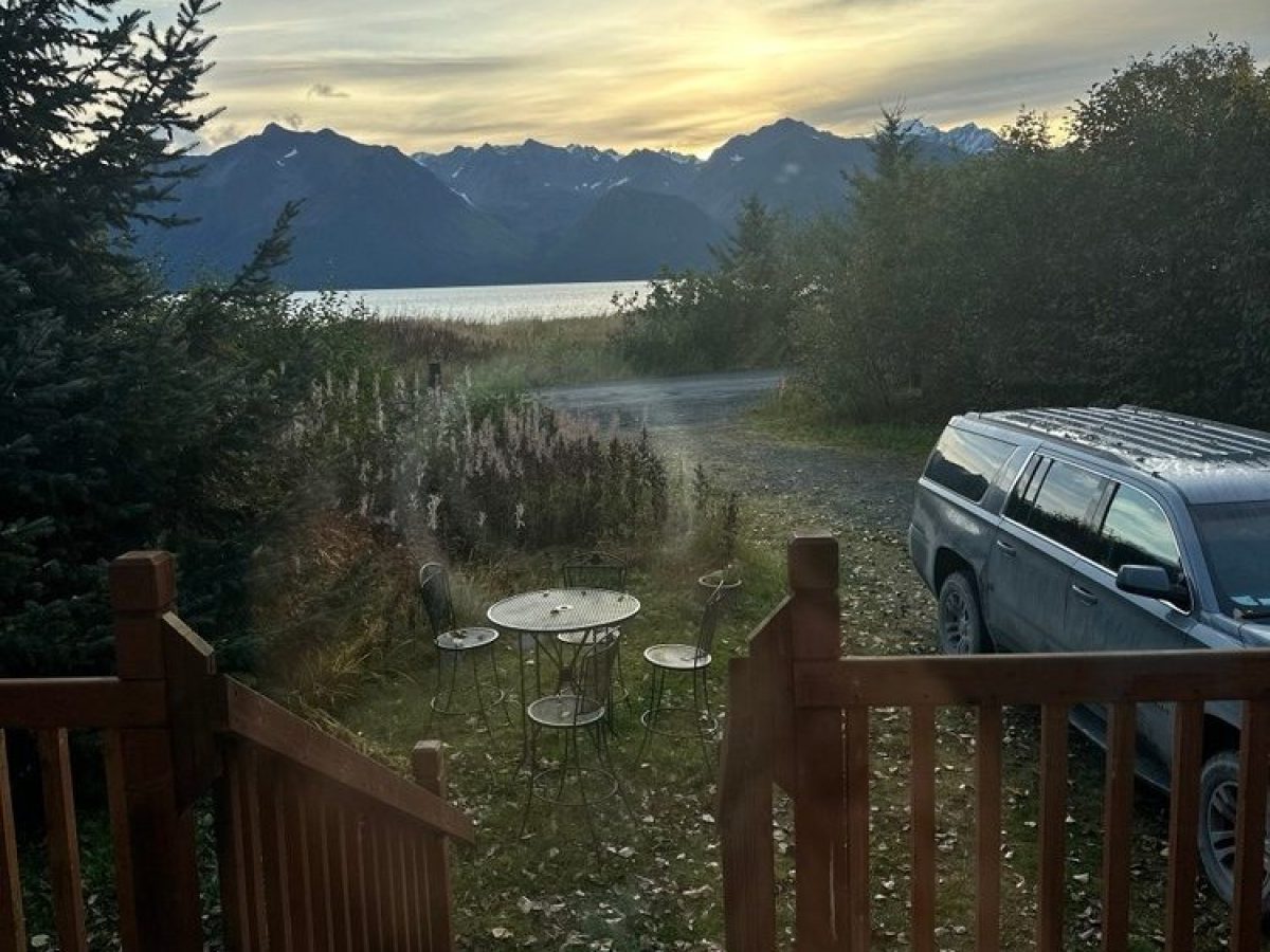a wooden bench overlooking a lake