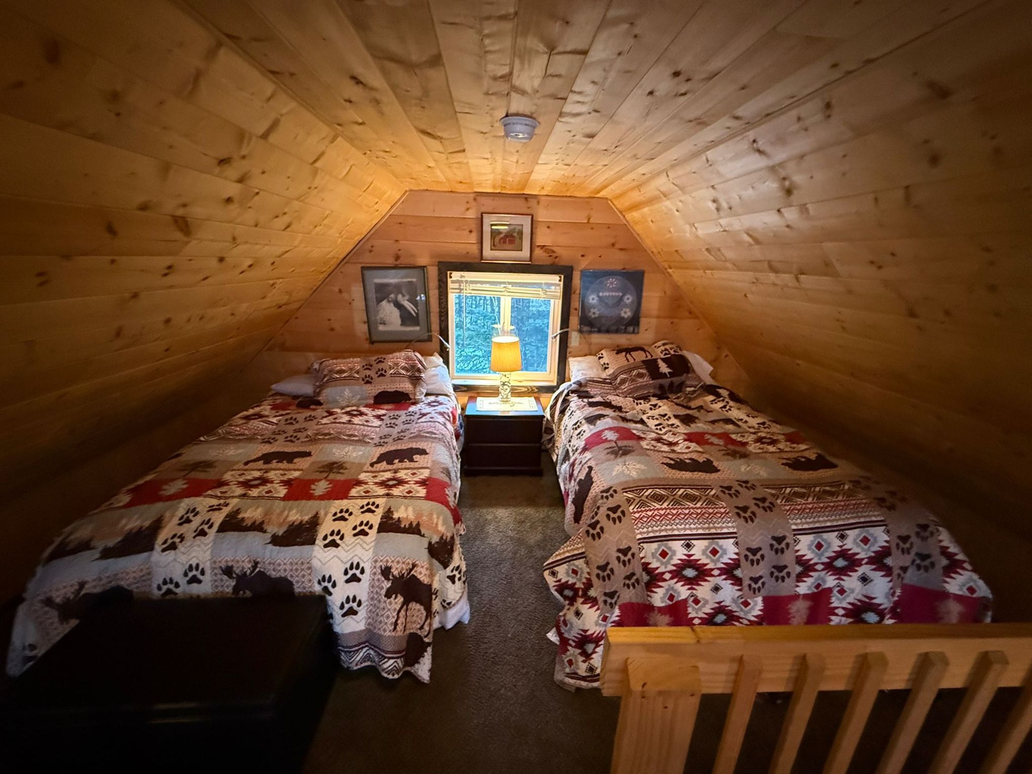 a bedroom with a bed in a room